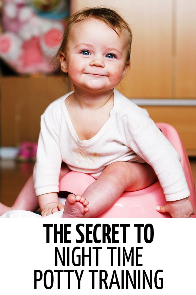 A little girl sitting on a pink potty before going to bed. The Secret to Successful Night Time Potty Training. Written by a pediatric doctor. #pottytraining #pottytrainingtips #nighttimepottytraining #toilettraining #pottytrainingtips #toddlers #toddlertips #lifewithtoddlers #parenting #parents #parenthood #parentlife #lifewithkids