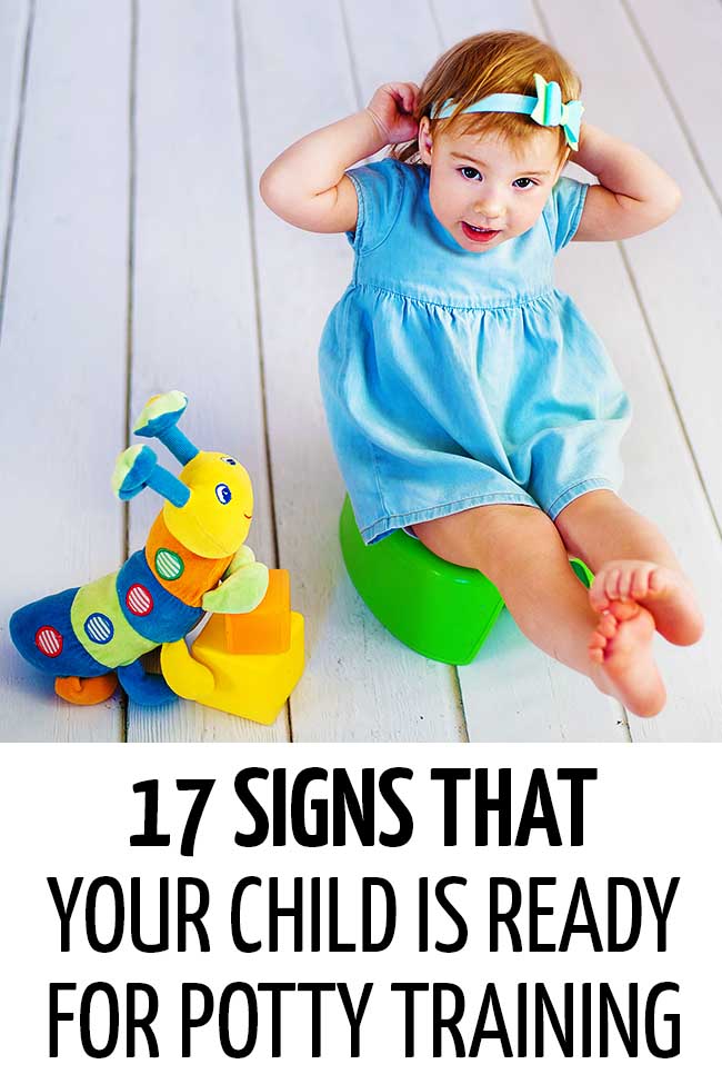 A little girl in a blue dress sitting on a green potty getting ready to potty train. #parenting #parents #parenthood #parentlife #lifewithkids #positiveparenting #pottytraining #pottytrainingtips  #toilettraining #pottytrainingtips #toddlers #toddlertips #lifewithtoddlers