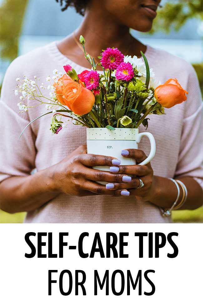 A mother holding a pot of flowers #selfcare #selfcareideas #selfcaretips #selfcareroutine 
