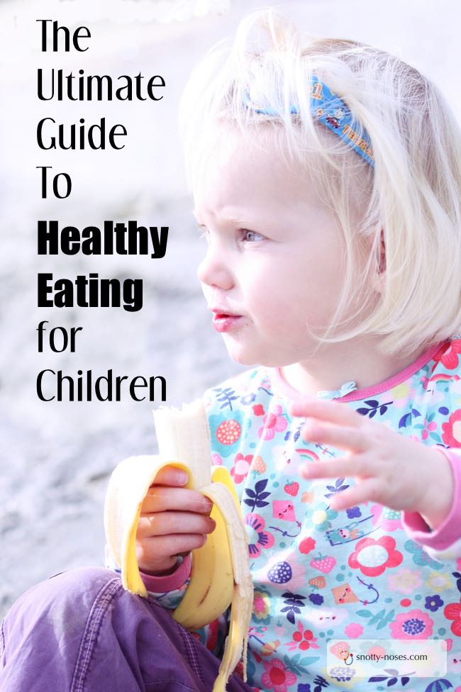 A child eating a banana. Healthy Meals for Children